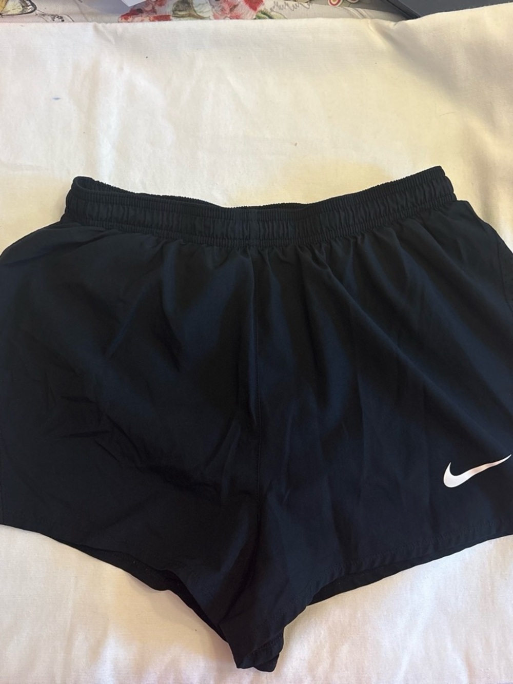 Nike Women's Black Athletic Running Shorts with White Swoosh